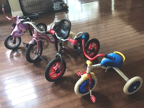 four tricycles side by side