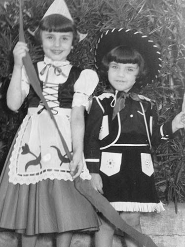 Mercedes Dash and sister at younger age in costumes