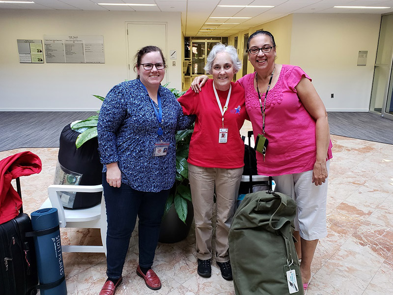 Carol Hutchinson, Janessa Deal and Fairfax Medical Reserve Corps volunteer Susan Jackson