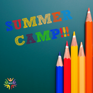 Image of a chalkboard that has Summer Camp written on it and three colored pencils lined up in front.