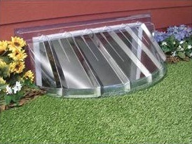 Window well with plastic cover.
