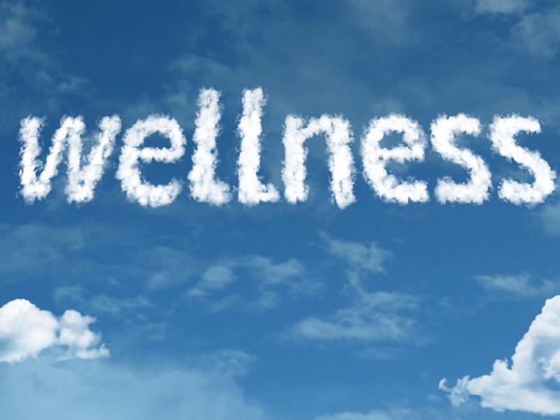Clouds spelling out 'wellness'