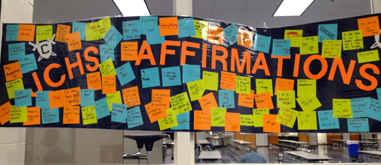 Photo of banner with affirmation Post-It notes