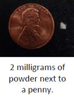 Photo of 2 milligrams carfentanil next to a penny