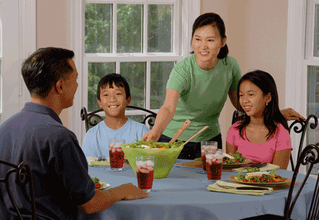 Photo of family at dinner table