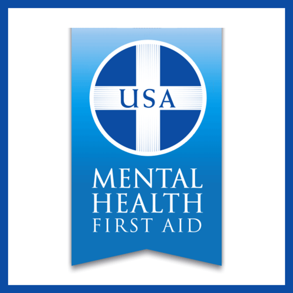 A logo for Mental Health First Aid courses with the title inside a graphic of a blue ribbon.