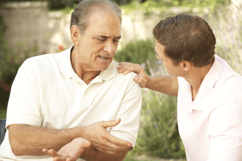 Photo of man having conversation with father