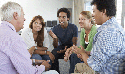 Photo of support group members talking