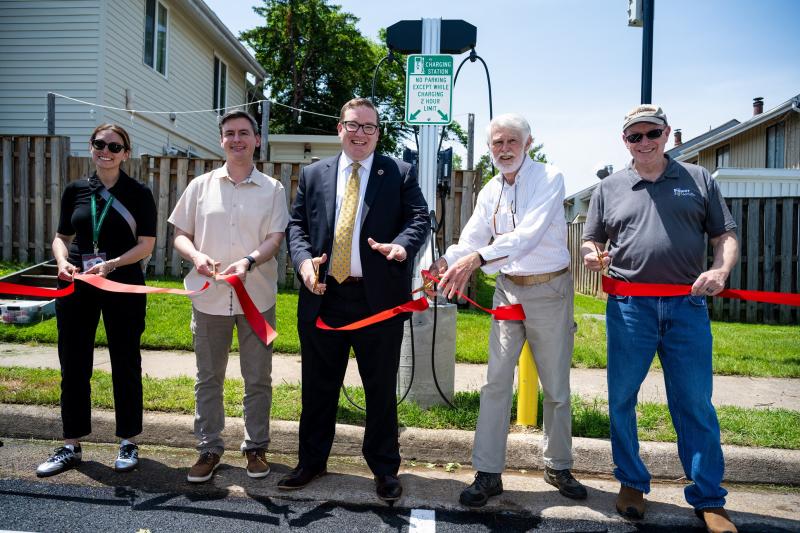 ev station ribbon cutting at reflection homes