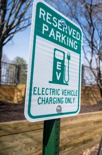 EV charging sign in parking lot