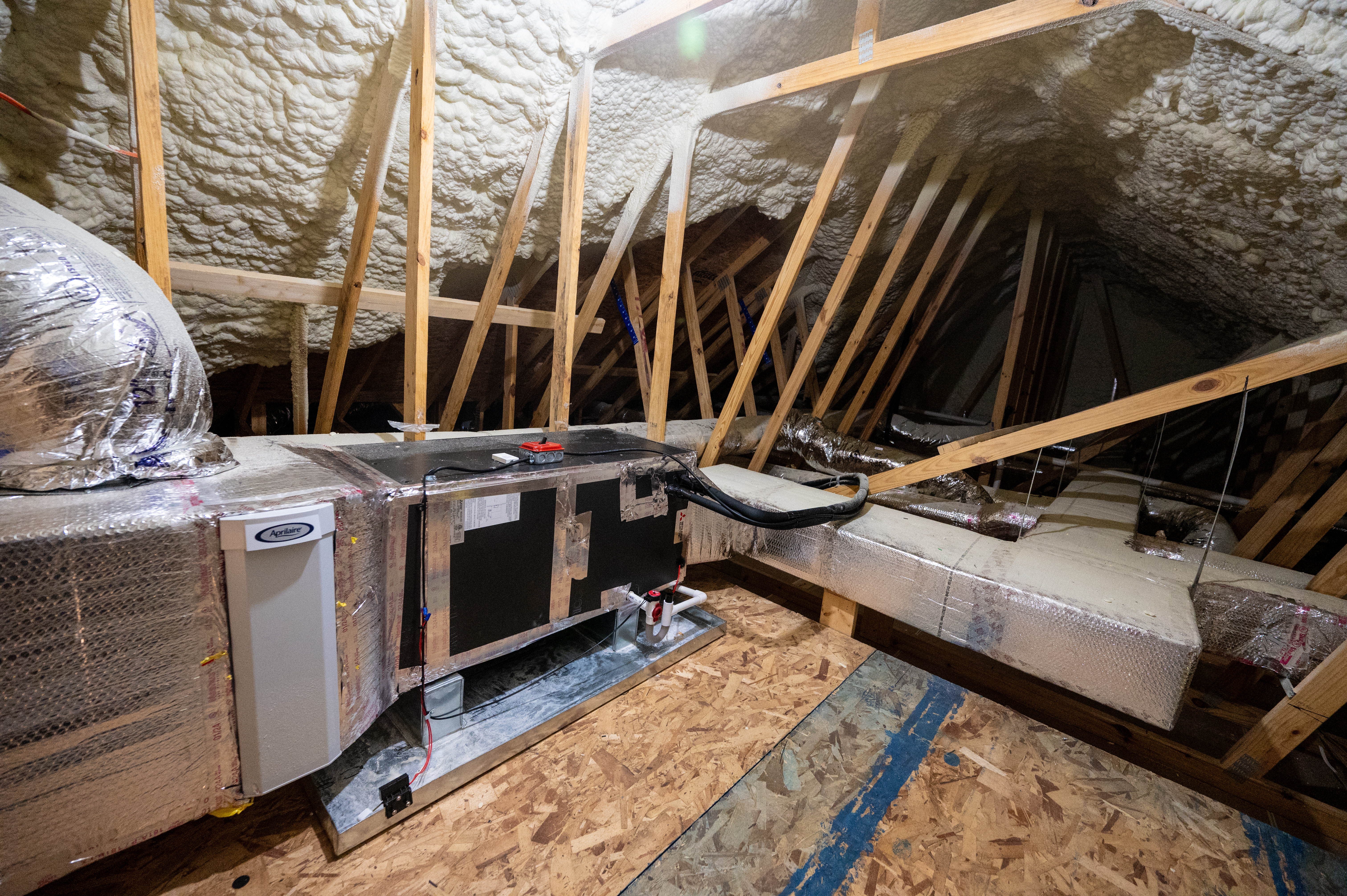 Insulated and appropriately sized duct work attached to Mitsubishi heatpump HVAC interior unit