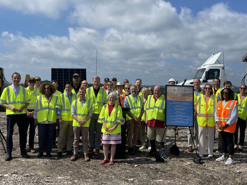 group photo at groundbreaking of solar landfill project