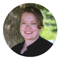 susan miller's headshot, a woman with a black shirt on