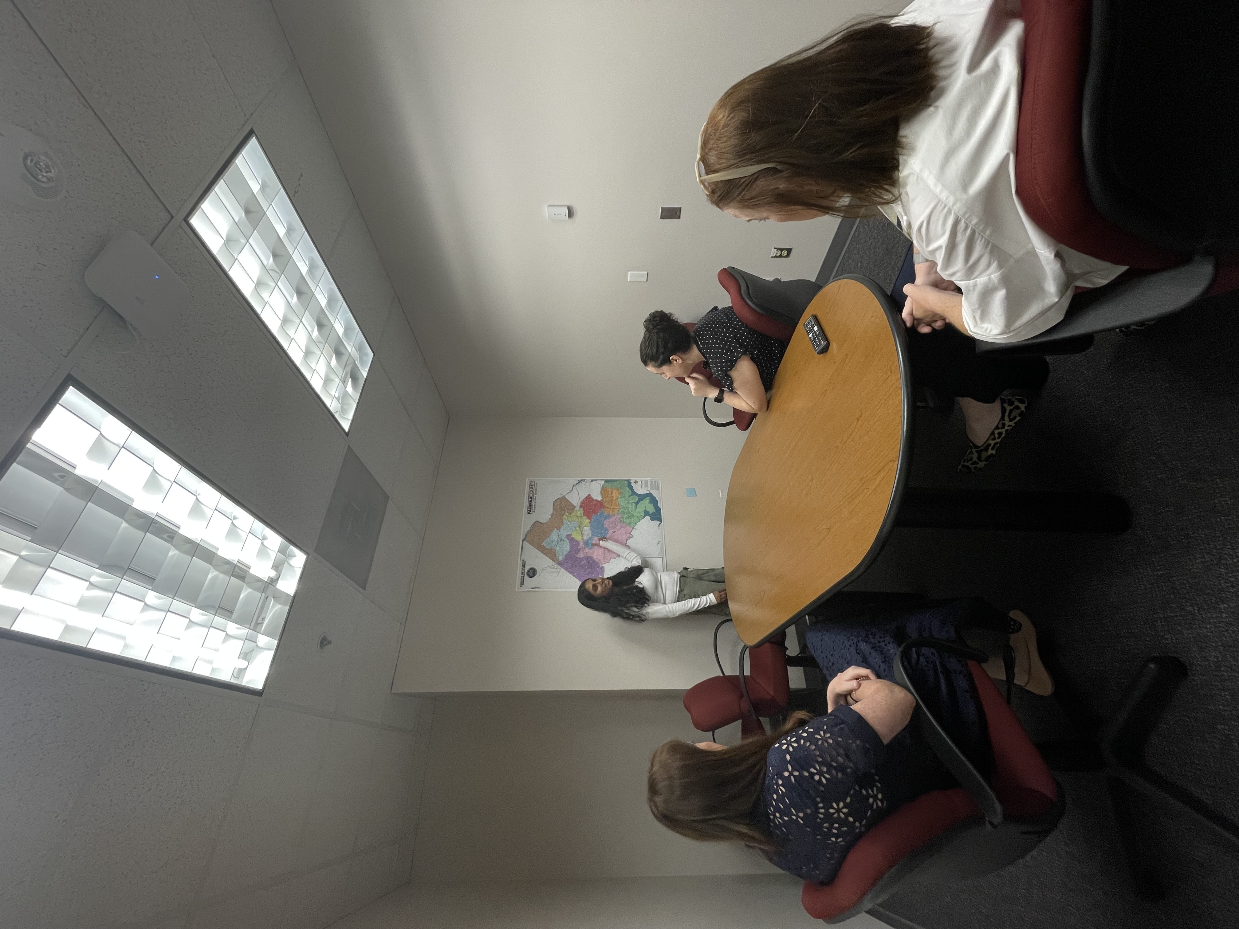 Arushi having a meeting with OEEC staff members Kelly, Sara and Kate
