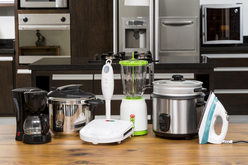 Different Appliances On Counter In The Kitchen