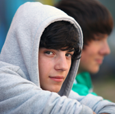 teen boy wearing hoodie