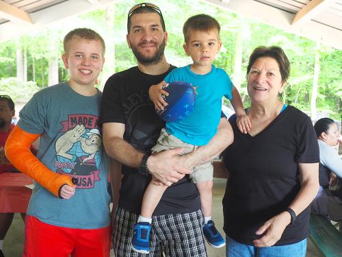 mom and dad with two children