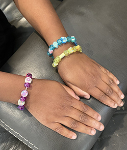 Kalani wearing bracelets