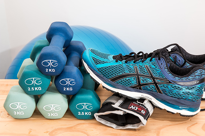 hand weights, shoes and exercise ball