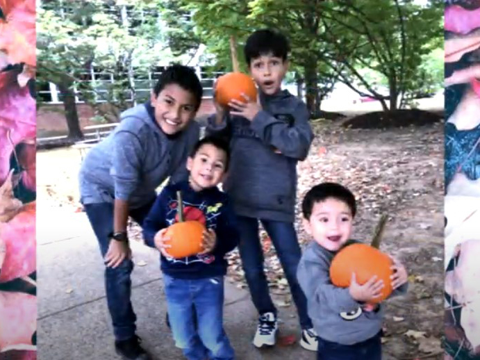 Morales family children holding pumpkins - video screen shot of photo