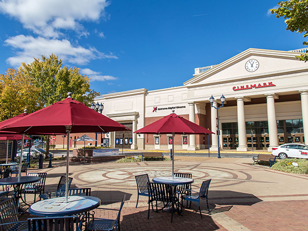 outdoor table near movie theater building