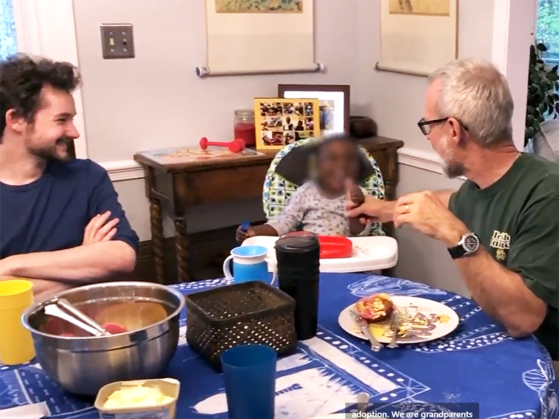 video screenshot Kokotajlos family sitting at dining table eating