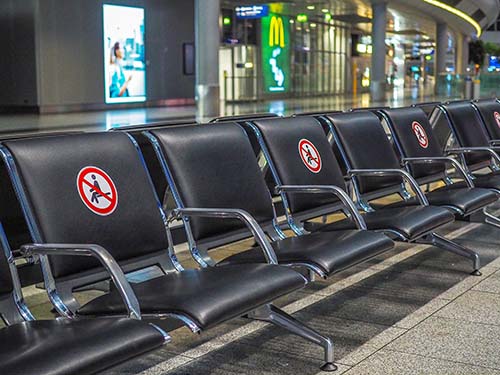 airport waiting area with row of seats