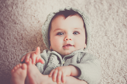 baby in knit hat