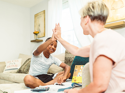 Child and Woman High Five