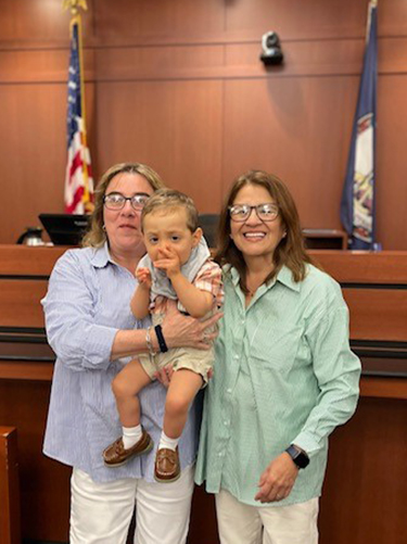 Antoinette, Alejandro, Gina in court room on adoption day