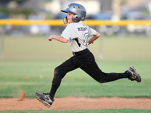 Child running bases