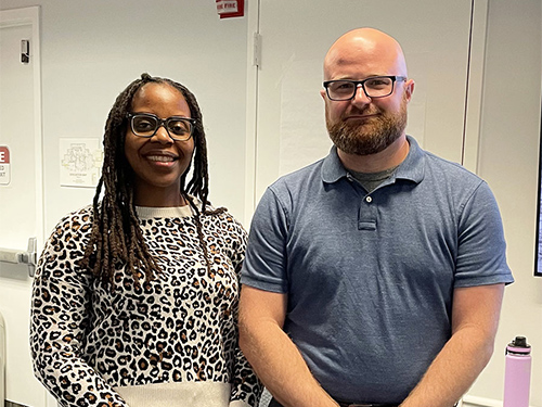 kinship training trainers, man and woman standing in classroom