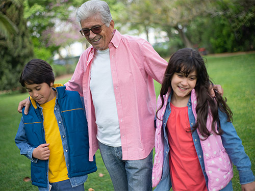 older man with two happy children