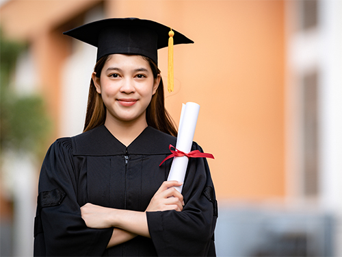 female graduate with diploma