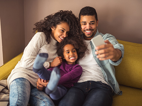family taking selfie