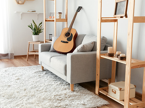 guitar on sofa