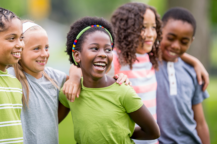 five children standing side by side