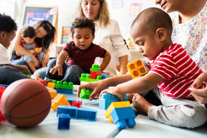 group of infants playing