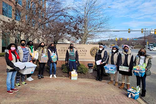 Girl Scout Troop 6545 donates baby boxes
