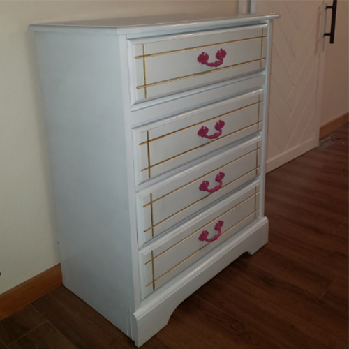 white and pink dresser