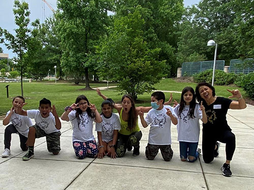 Mentor and group of children 