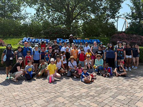 BeFriend Mentors and Mentees in front of Kings Dominion sign