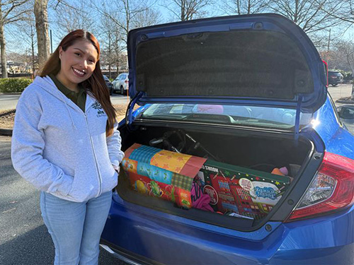 donor with gifts in car