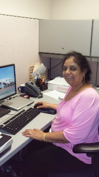Administrative Assistant volunteer working at computer
