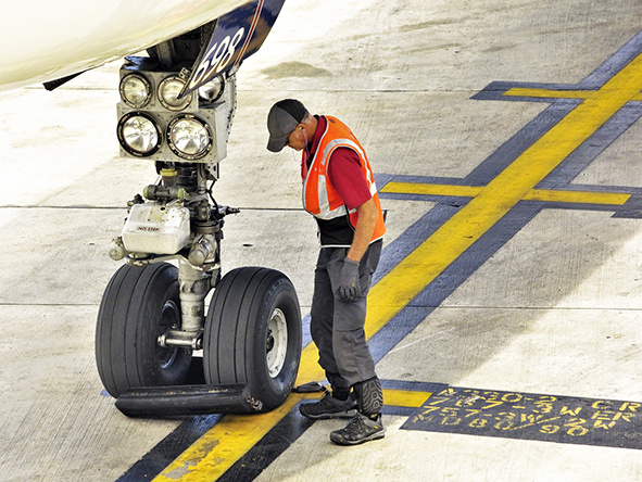 person working on airplane