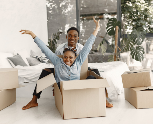 couple with moving boxes