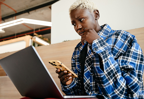 woman looking at computer screen