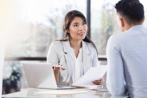 woman interviewing job candidate 