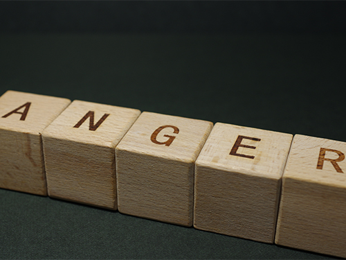 wooden blocks that spell anger