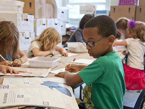 children working at school table